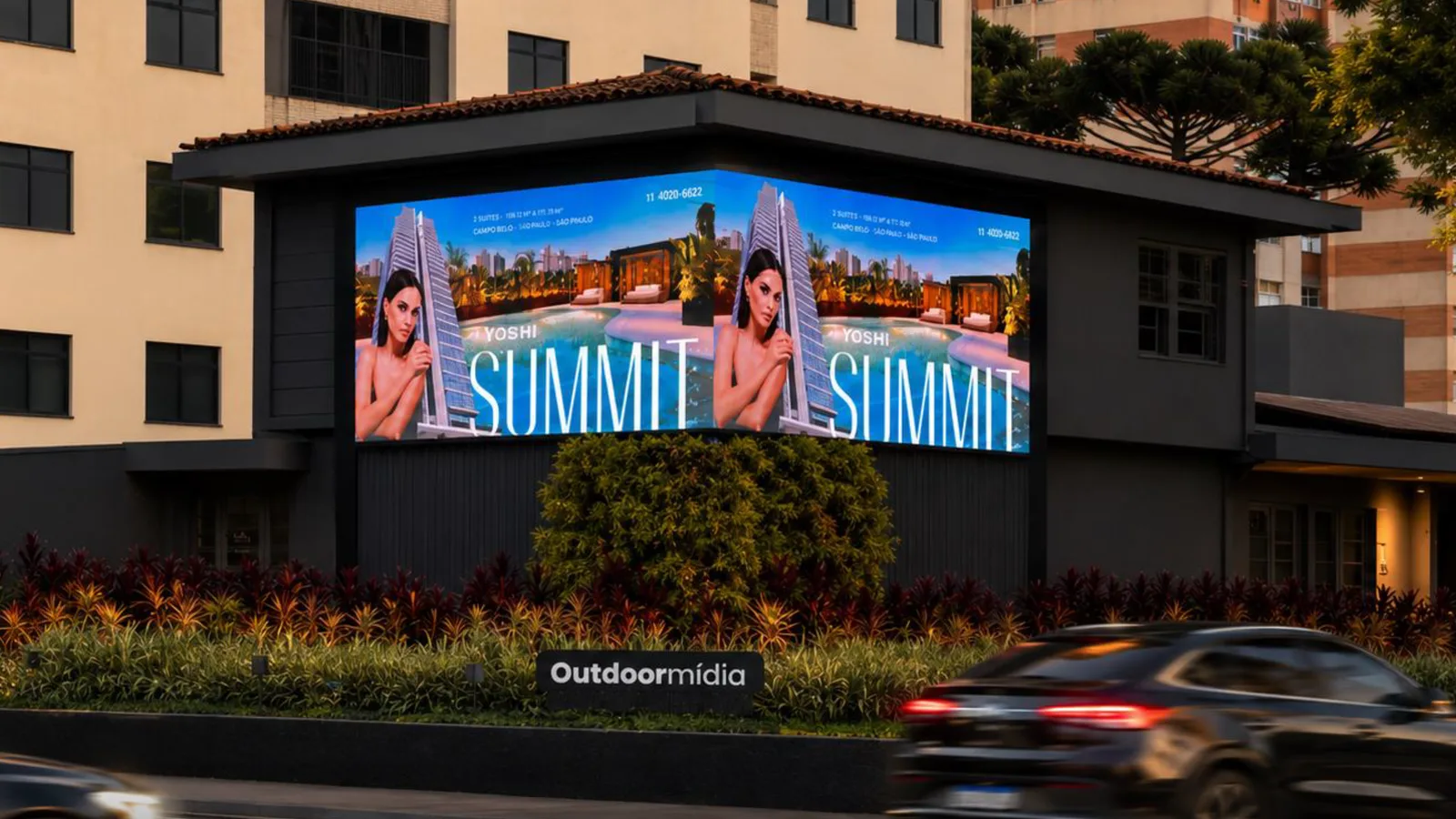 Painel de LED da Outdoormídia em fachada de prédio, veiculação digital atual.